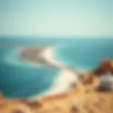 A panoramic view of Al Qurm Beach showcasing its pristine shoreline and azure waters.