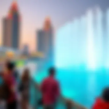 Visitors enjoying the Dubai Fountain show from the boardwalk