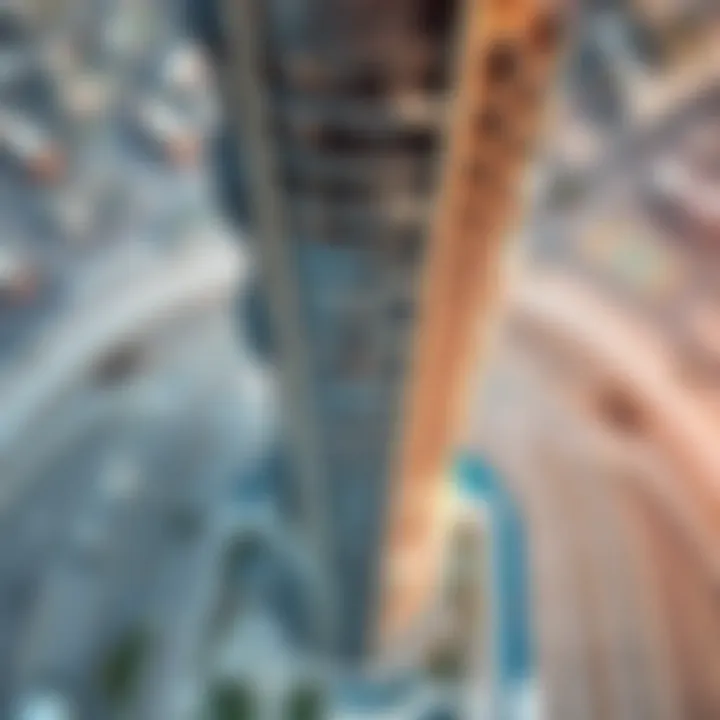 Architectural Marvel: Aerial Perspective of Merano Tower Aerial view of Damac's Merano Tower showcasing its unique architectural design